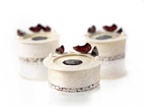 Creation for Café Pouchkine, soft biscuit, creamy panna cotta, black cherry coulis, fresh cherries, crunchy chocolate